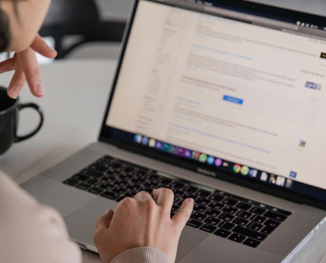 A person working at their laptop